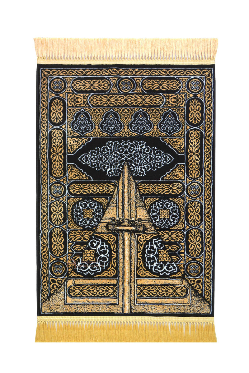 The door of the Kaaba prayer mat